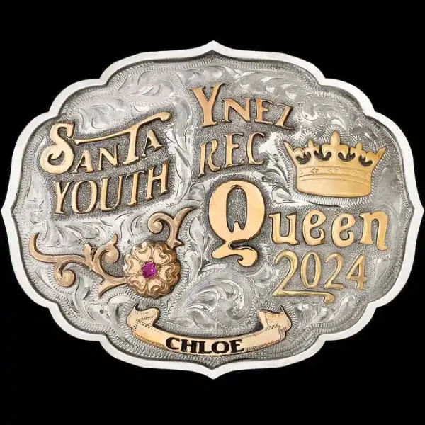 A Custom Buckle built as beautiful as the Teton Mountains in Wyoming. This buckle is hand engraved on a German Silver Base with a natural finish. Detailed with a solid edge, Jeweler's Bronze scrolls, flowers, and banner at the bottom. 